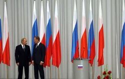 Russlands Präsident Wladimir Putin und der polnische Regierungschef Donald Tusk bei der Gedenkfeier zum 70. Jahrestag des Überfa