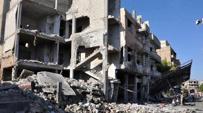Zerstörte Gebäude in Bab Tadmour, einem Stadtteil von Homs. In Syrien ist es zu einer Serie von Anschlägen gekommen. Foto: Sa